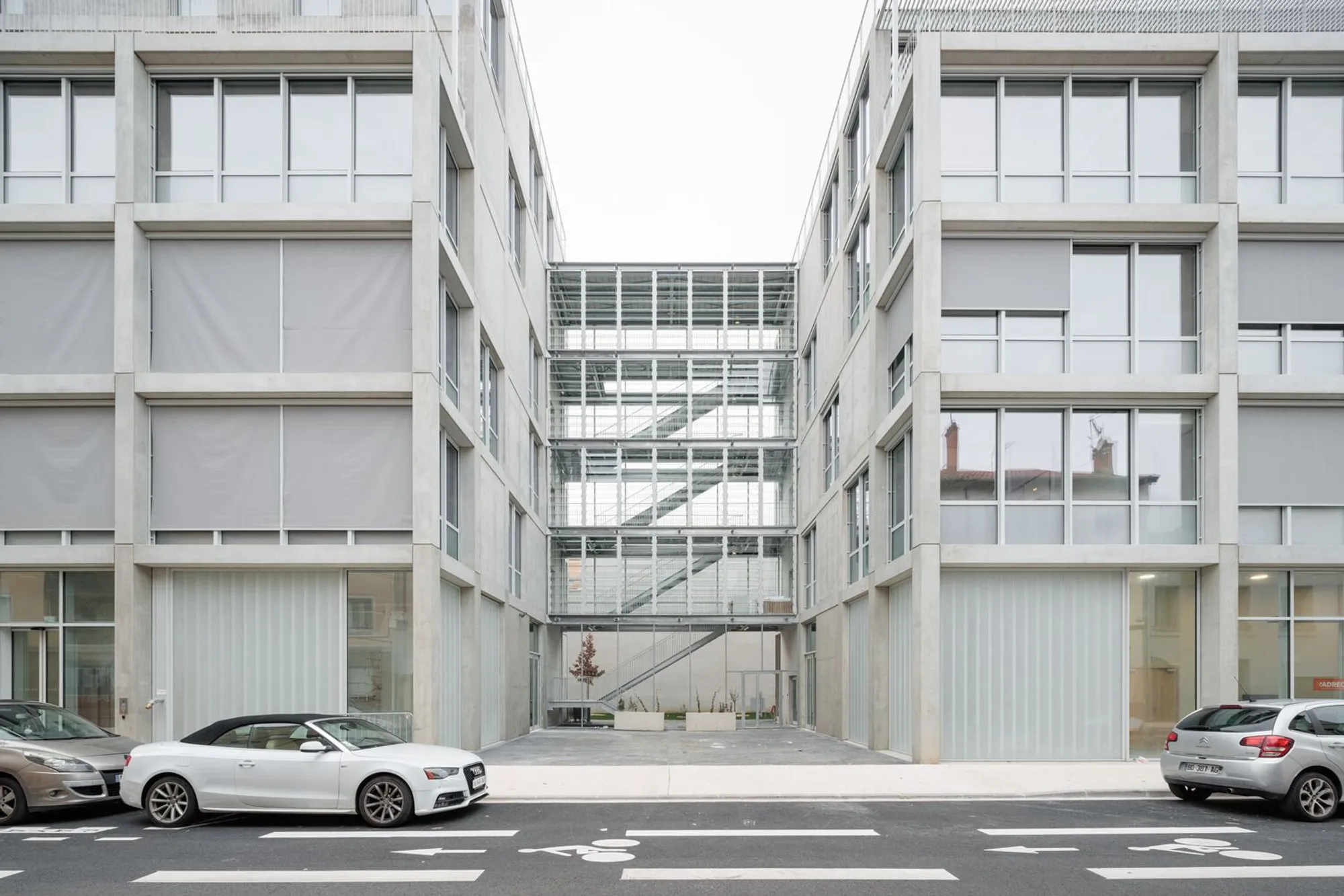 TRIPTYQUE Revives Villeurbanne's Industrial Logic with a Three-Volume Productive City Block