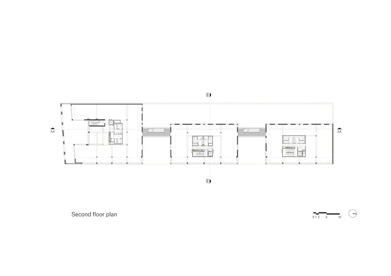 Second floor plan drawing showing three separate volumes connected by enclosed bridges