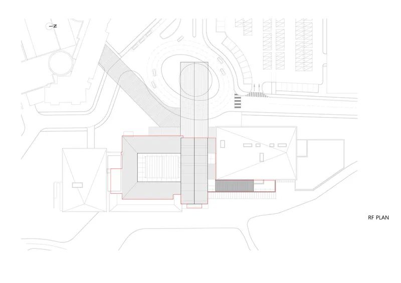 Roof plan drawing depicting a cylindrical tower element adjacent to rectangular rooftop volumes and surrounding streets