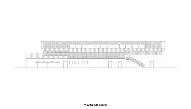 North elevation drawing showing the long facade with clerestory windows and exterior stair