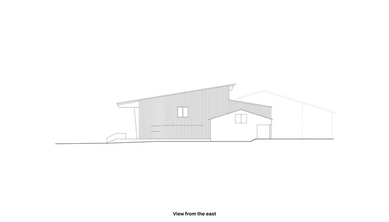 East elevation drawing showing varying roof heights and vertical cladding details on multiple volumes
