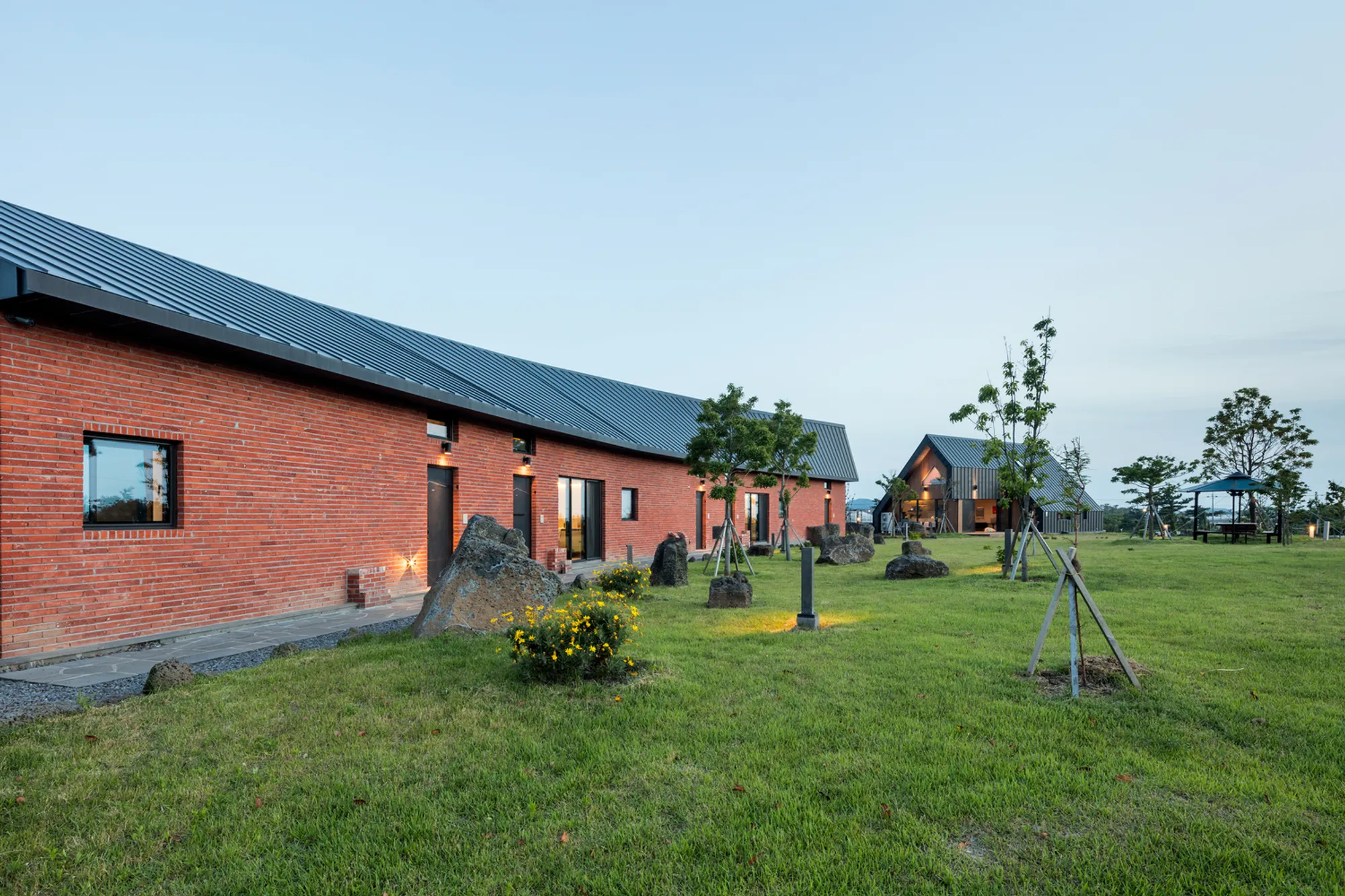 LIFE Architects Scatters Five Pool Villas Across a Jeju Hilltop Under One Sweeping Roof