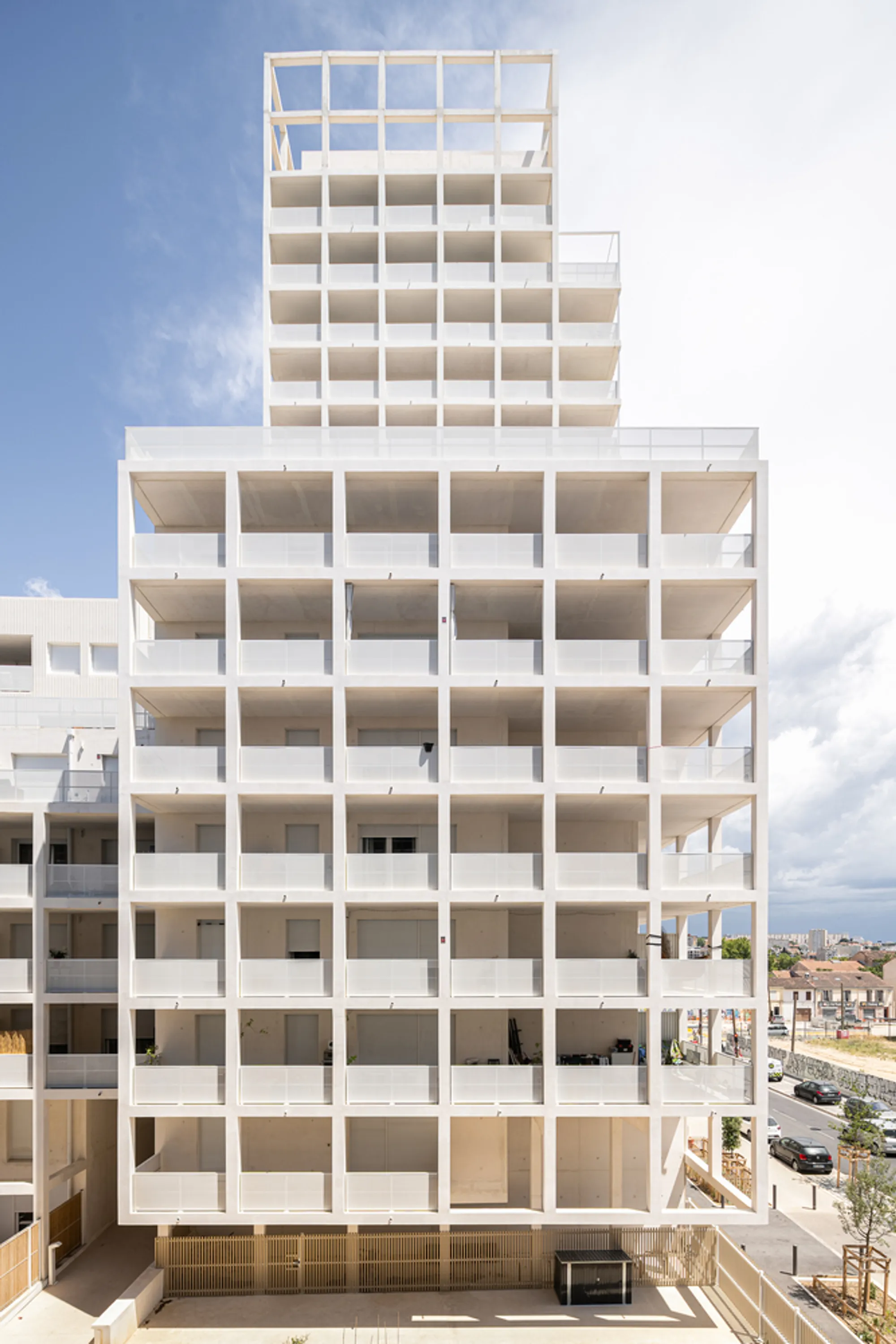 Rémy Marciano Casts a Low-Carbon Concrete Grid Across 148 Homes in Marseille's Euroméditerranée