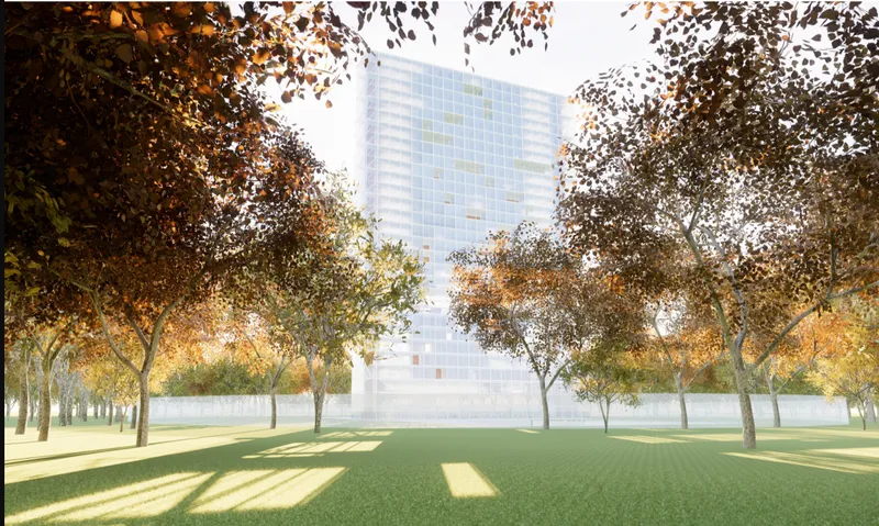 Glass tower seen through a grove of autumn trees casting long morning shadows across the lawn