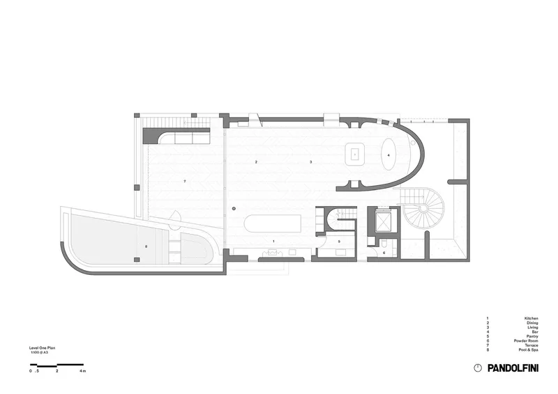 Level one floor plan showing open living space with curved glass wall and spiral stair