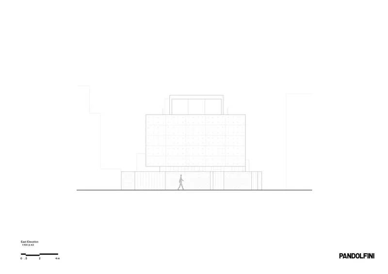Elevation drawing showing the textured facade with central window and a walking figure below