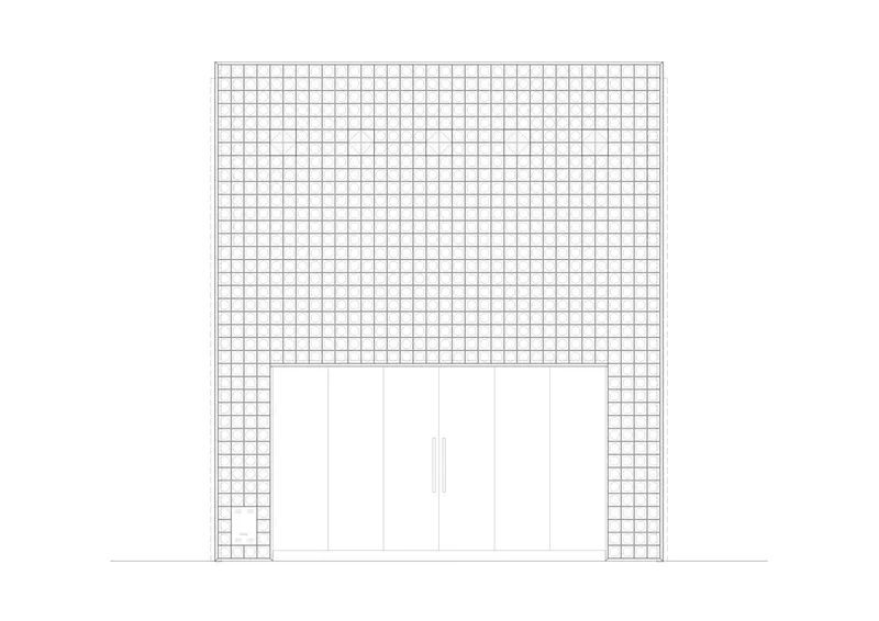 Elevation drawing showing gridded masonry facade with recessed entry and central double doors