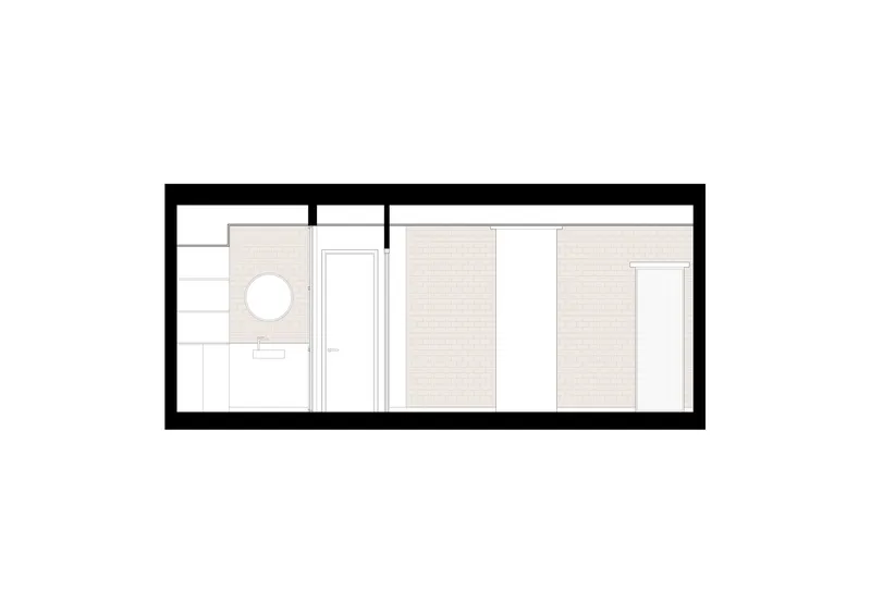 Section drawing showing interior spatial relationships and exposed brick wall locations