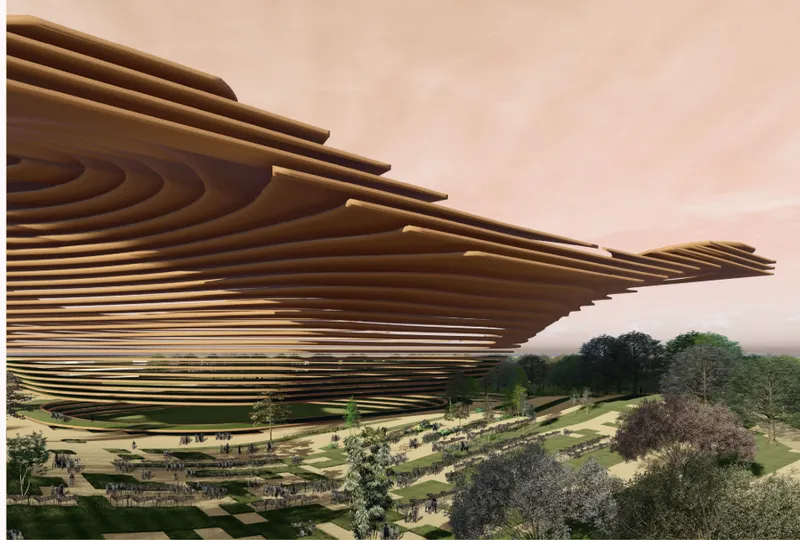 Side view of the cantilevered layered roof extending over landscaped grounds at dusk