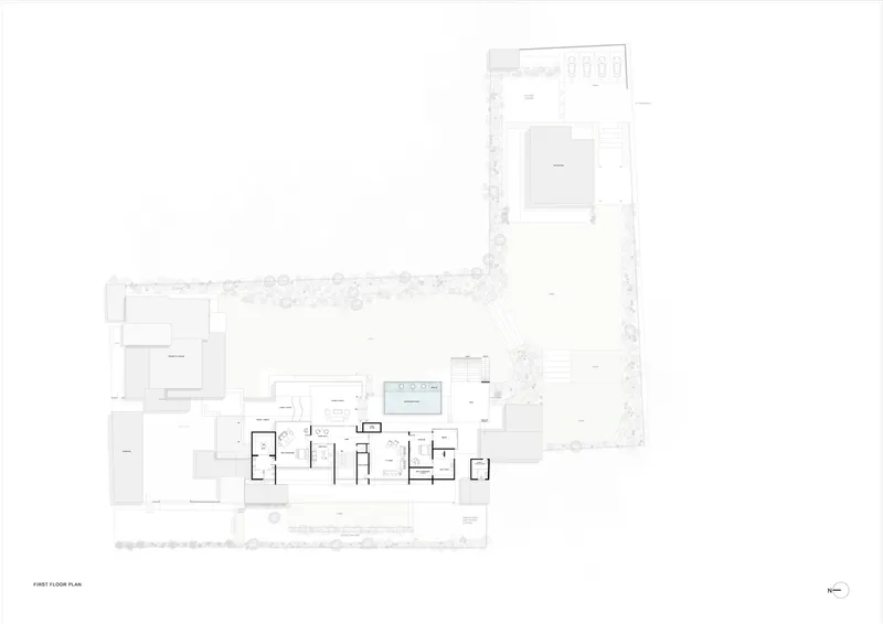 First floor plan drawing showing the interior layout with pool and landscaped perimeter