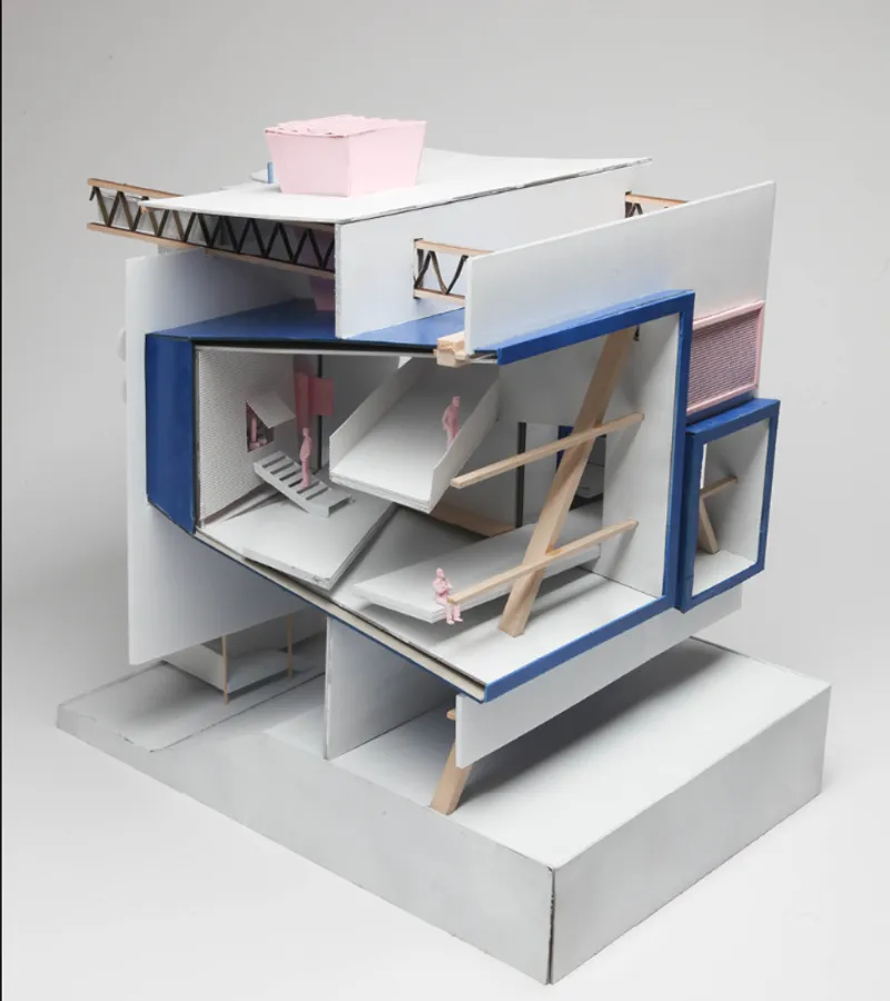 Physical model cutaway exposing staggered floor plates connected by diagonal timber stairs and figures in pink