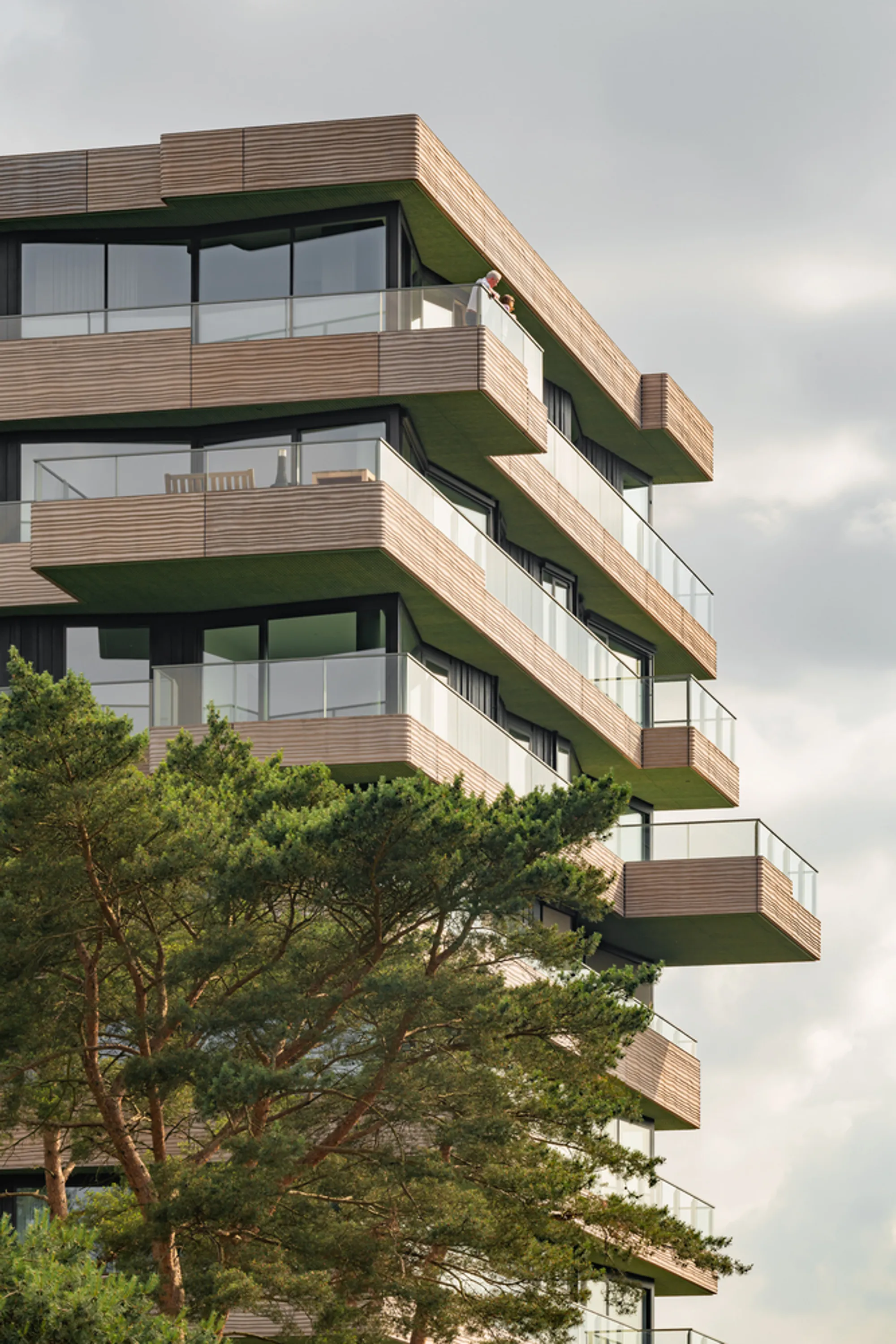 Orange Architects Stacks Forest Villas into a Nature-Inclusive Tower on the Edge of a Dutch Woodland