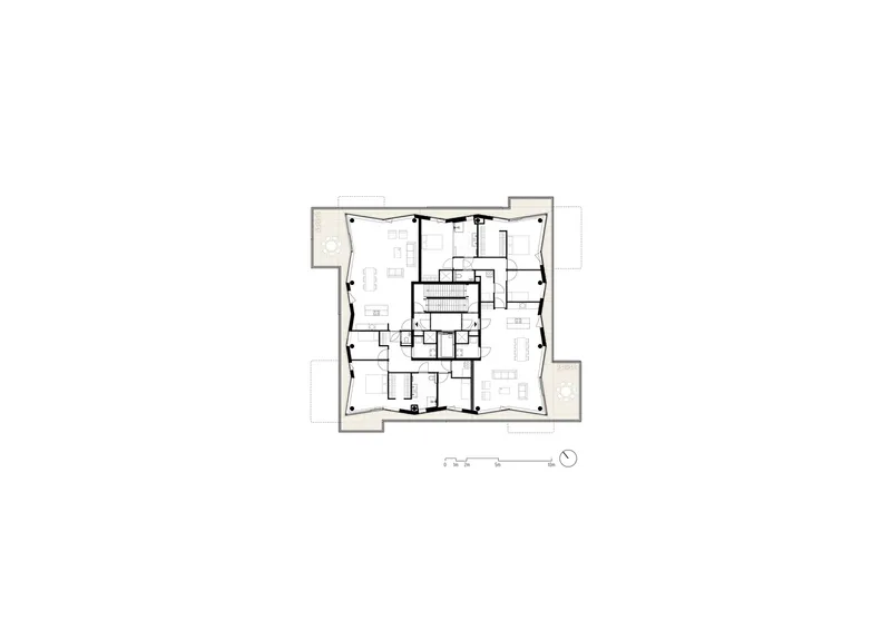 Floor plan drawing showing a square layout with central stair core and rooms radiating outward