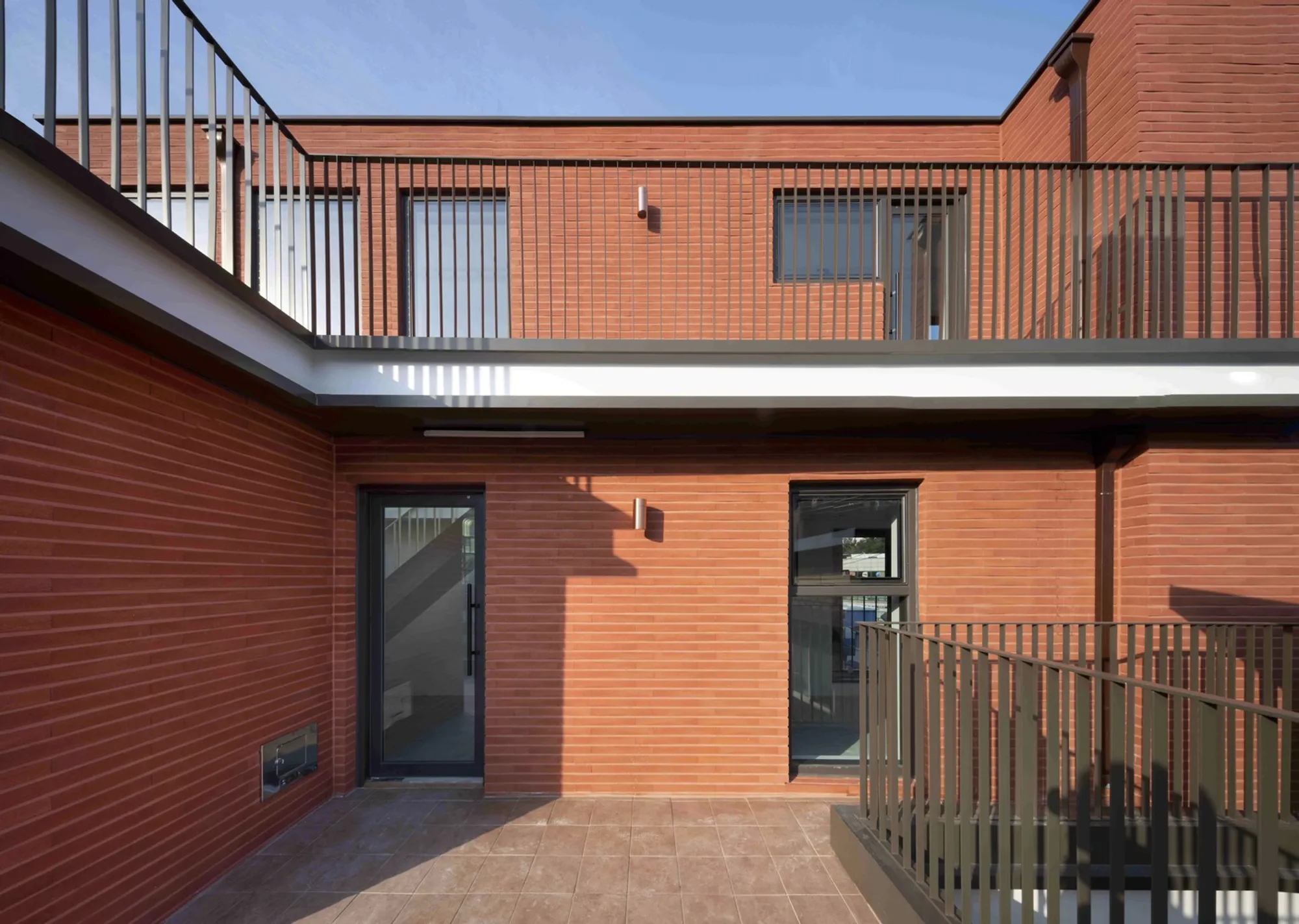 Donggarm Architecture Plants a Red Brick Sprout on a Fading Seoul Street