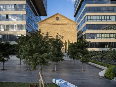 PARALX Threads a 19th-Century Church Between Two Office Towers on Beirut's Former Green Line