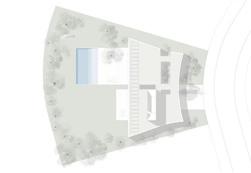 Site plan showing the L-shaped building footprint with pool and scattered trees on an irregular lot