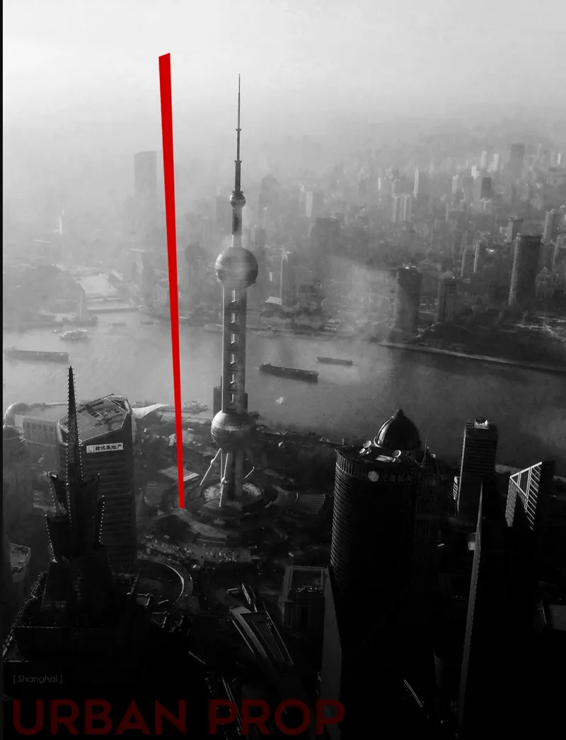 Aerial view of a spherical tower and dense urban skyline shrouded in heavy fog