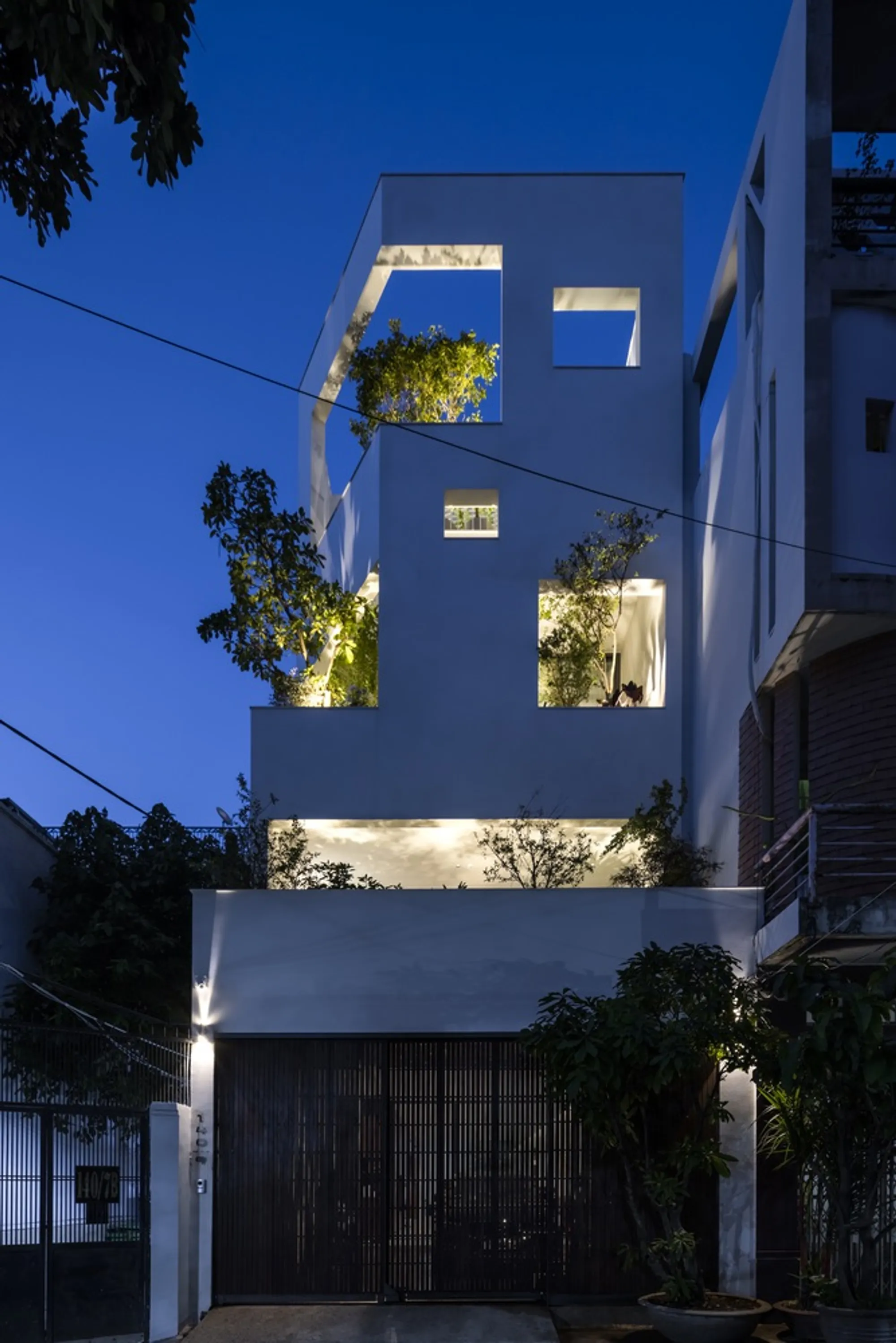 23o5Studio Weaves a Vertical Garden Through a 132 m² Saigon Townhouse