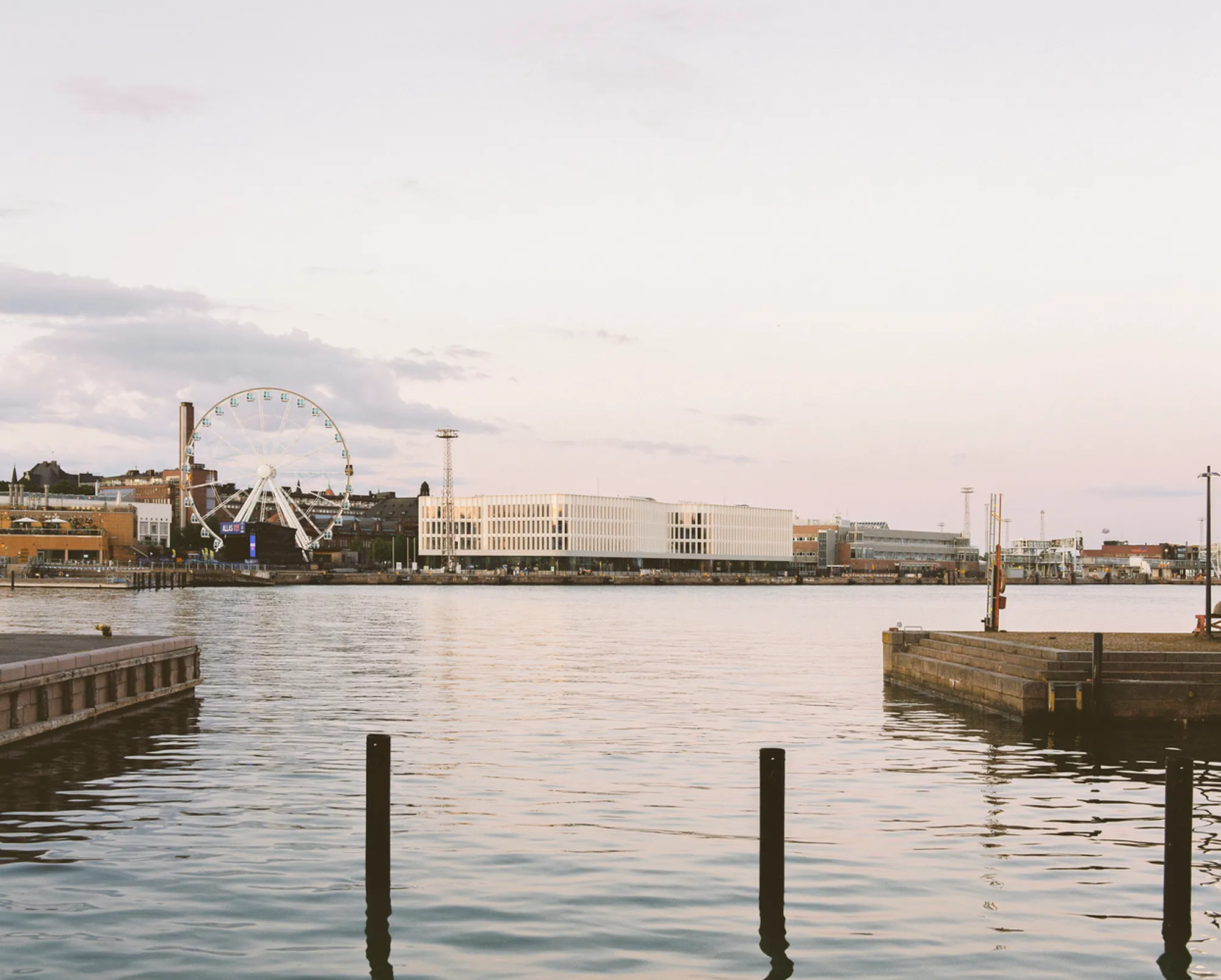 Katajanokan Laituri: Sustainable Wood Office and Hotel by Anttinen Oiva Architects
