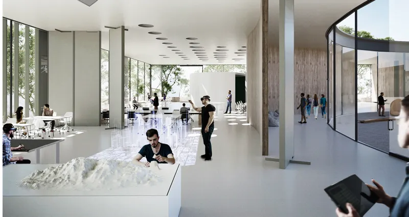 Gallery space with white resin floor, cylindrical columns, and visitors viewing models under recessed ceiling lights