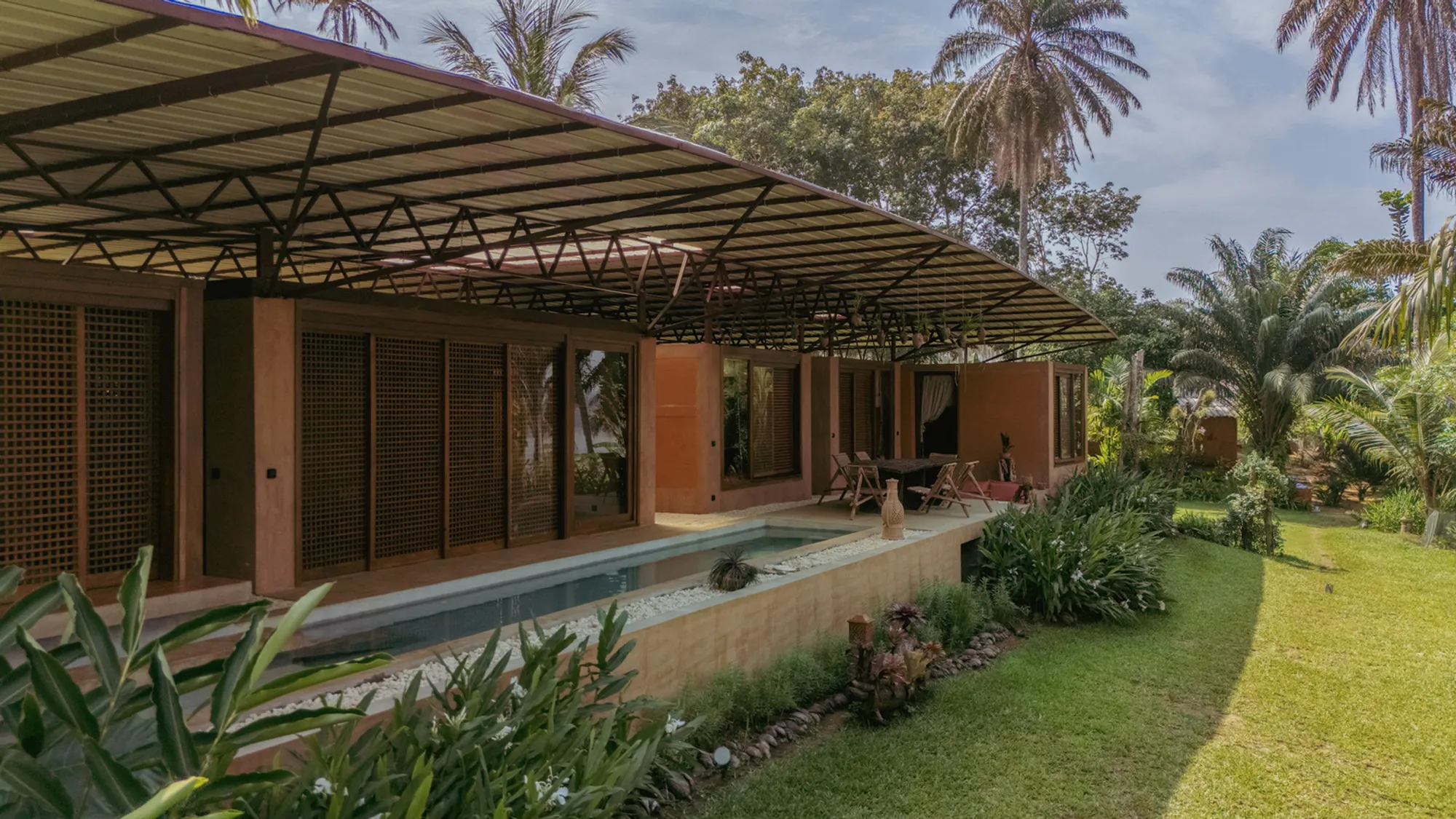 Moyésoa Builds a Rammed Earth Retirement Pavilion on the Edge of an Ivorian Lagoon