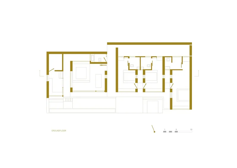 Ground floor plan drawing depicting an asymmetrical layout with clustered rooms on the right side