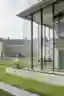 Four Studios Turn a Belgian Military Barracks into a Glass Tower Wrapped in Winter Gardens