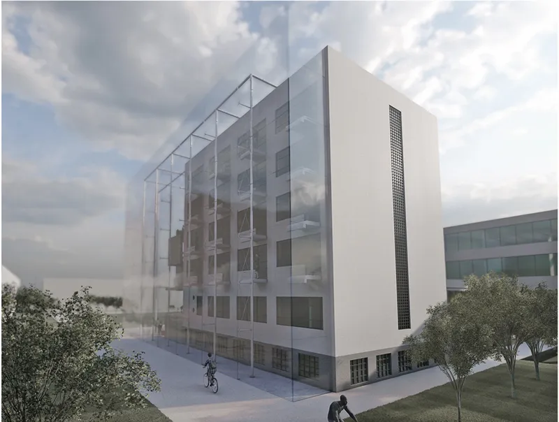 Corner view of the white facade with transparent scrim canopy and cyclists in the plaza