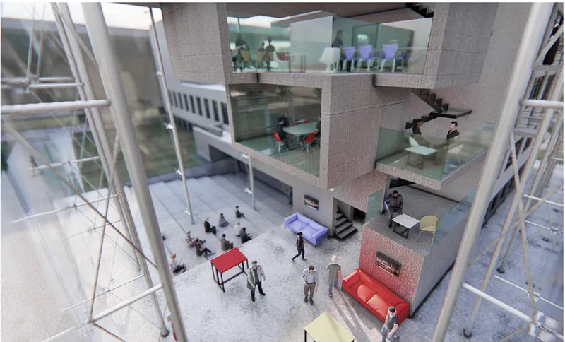 Aerial view into the multi-level atrium with red furniture and people on circulation bridges