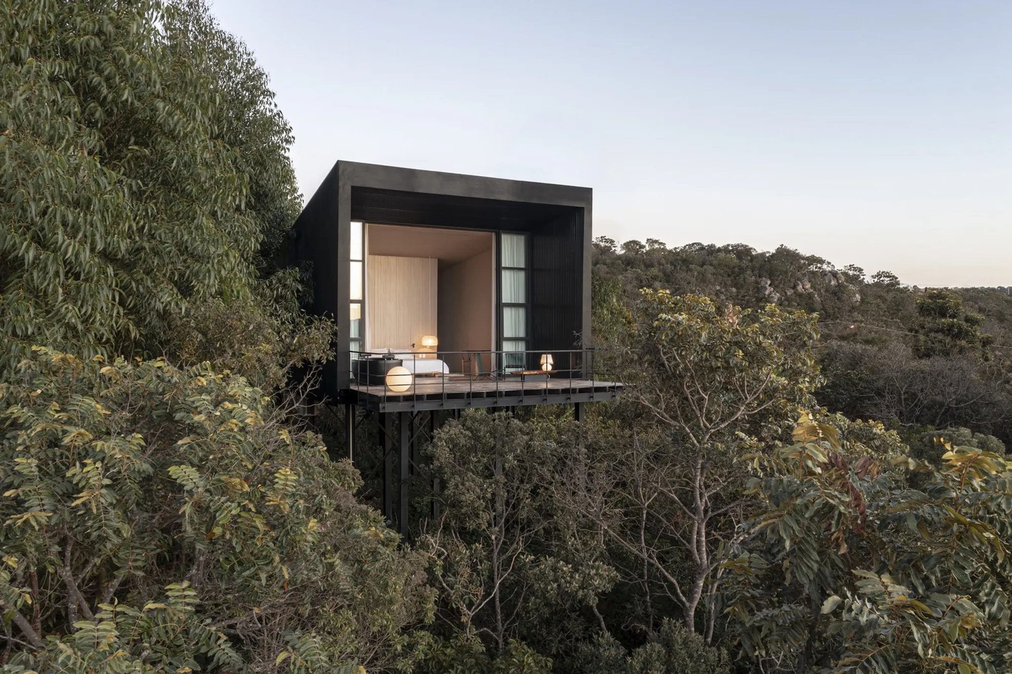 Alan Chu Lifts a Trapezoidal Monocle Above Brazil's Cerrado to Frame the Sunrise