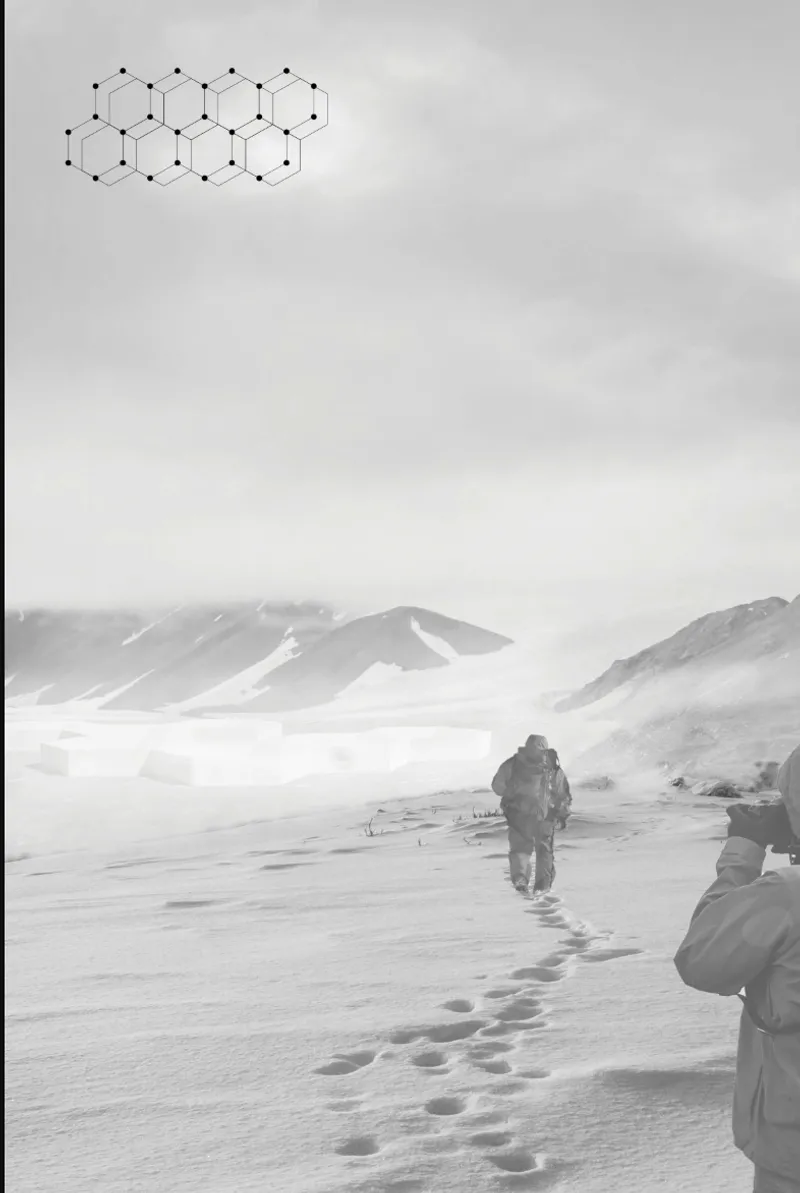 Aerial view of a figure walking through deep snow with hexagonal diagram overlay