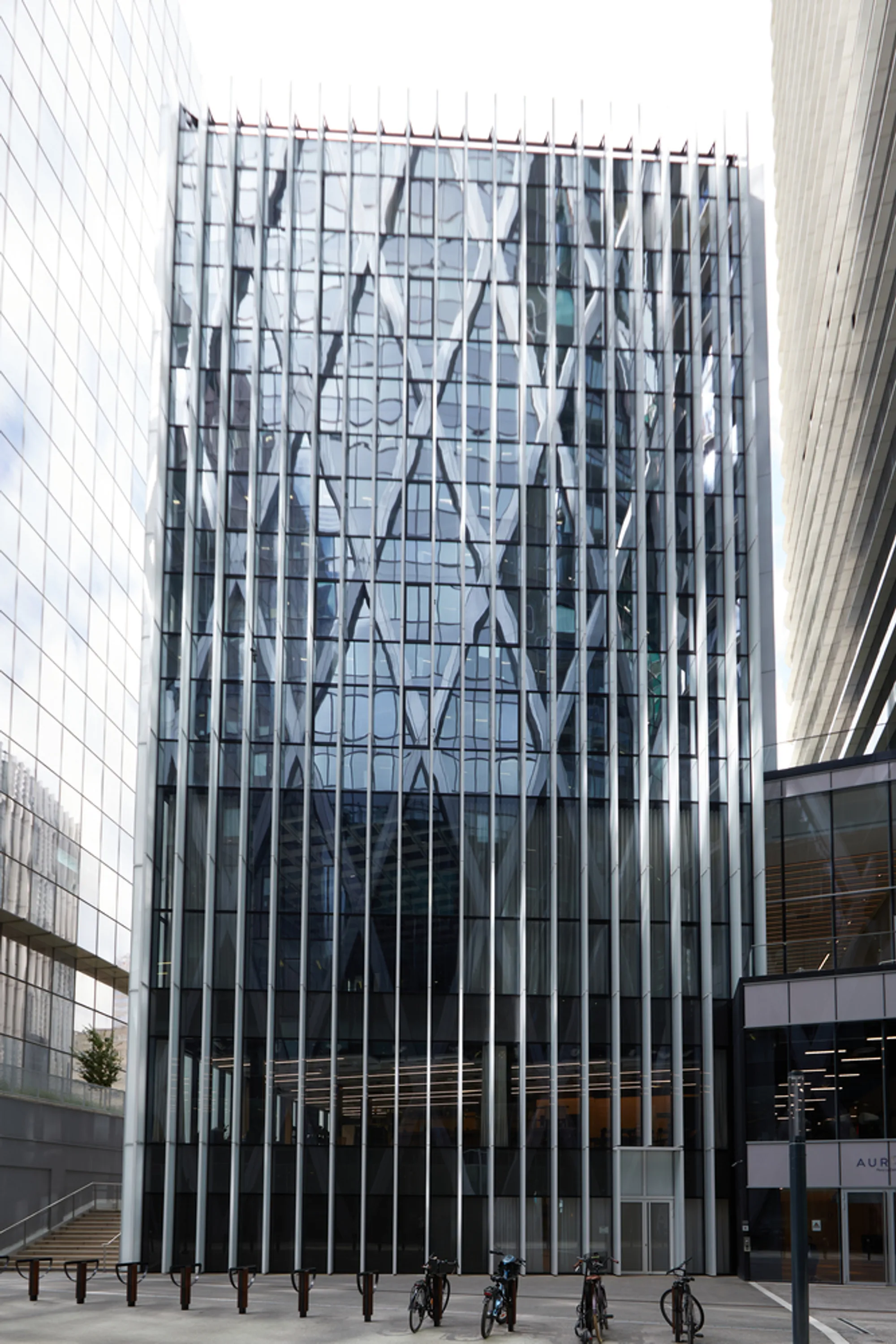 Sisto Studios Wraps a Ten-Story Lantern in Frosted Glass Fins at La Défense