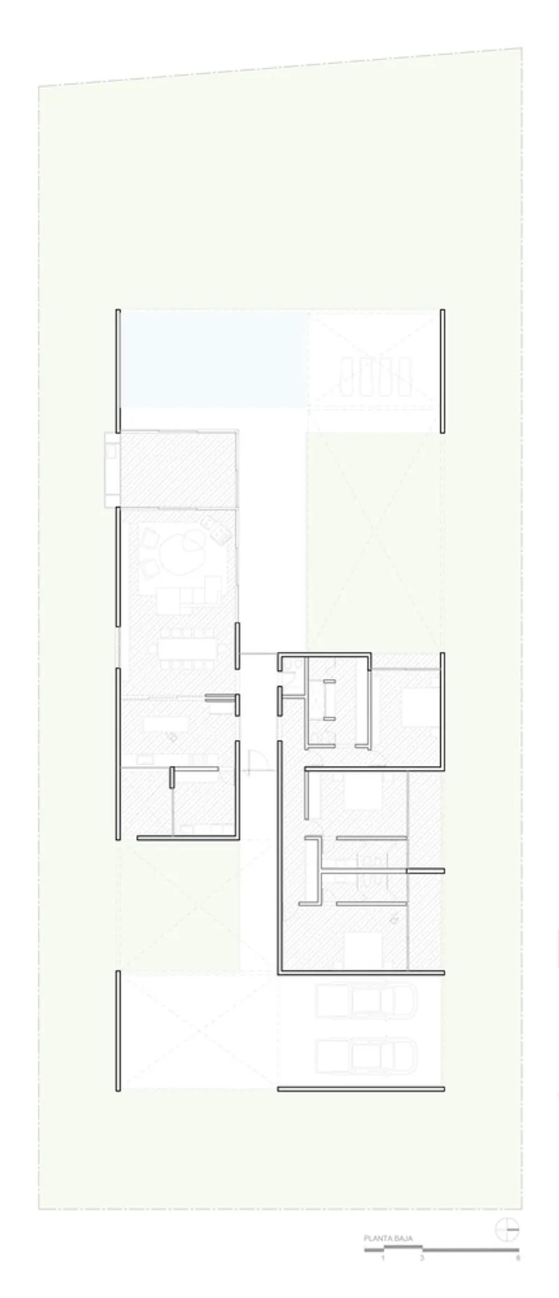 Floor plan drawing showing irregularly arranged rooms around a central courtyard and pool