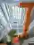 JC Design Threads a Breathing Atrium and Orange Staircase Through a Huizhou R&D Building