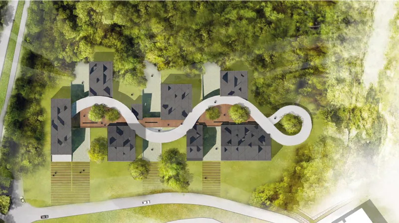 Aerial plan view of a white curving pathway linking residential blocks surrounded by green lawns and trees