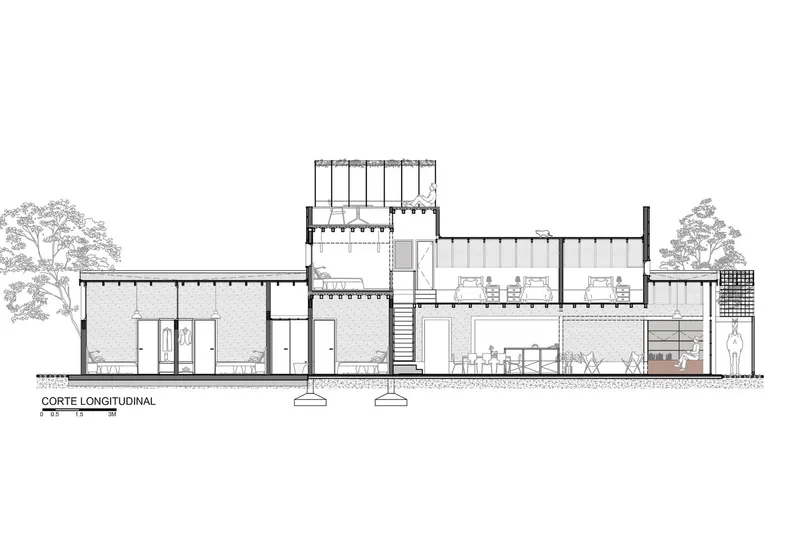 Longitudinal section drawing showing interior spaces with staircase and rooftop steel structure