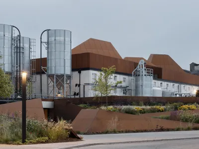 ODOS Architects Turns a Dormant Irish Grain Mill into a Whiskey Distillery of Corten and Concrete