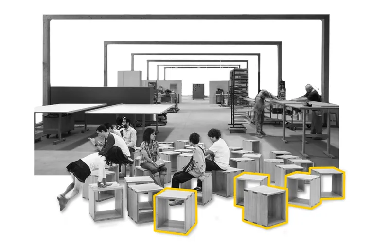 Workers assembling modular cube seating elements in a studio with nested frame structures overhead