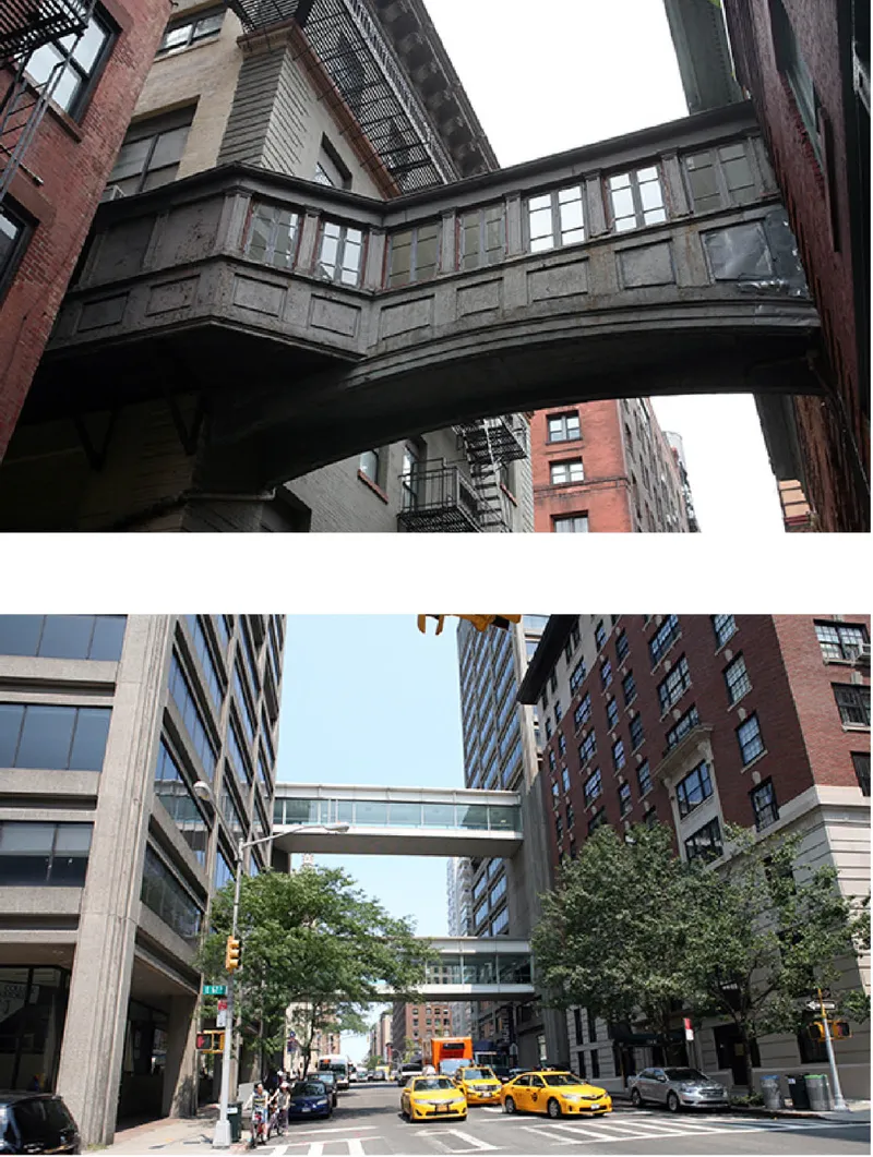 Weathered enclosed pedestrian bridge with paneled walls spanning between brick buildings with fire escapes