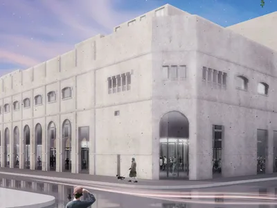 Ex-American Cinema Modular Housing: Living Units Plugged into Industrial Bones