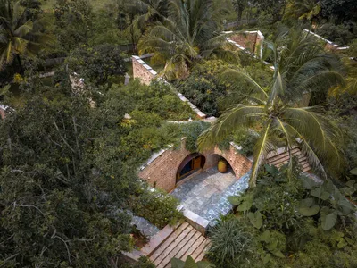 Subterranean Ruins by A Threshold: A Sustainable Retreat Blending with Nature