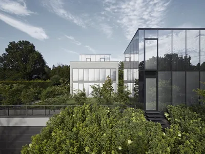 House E by CHRIST.CHRIST. Associated Architects: A Harmonious Blend of Reflection and Materiality
