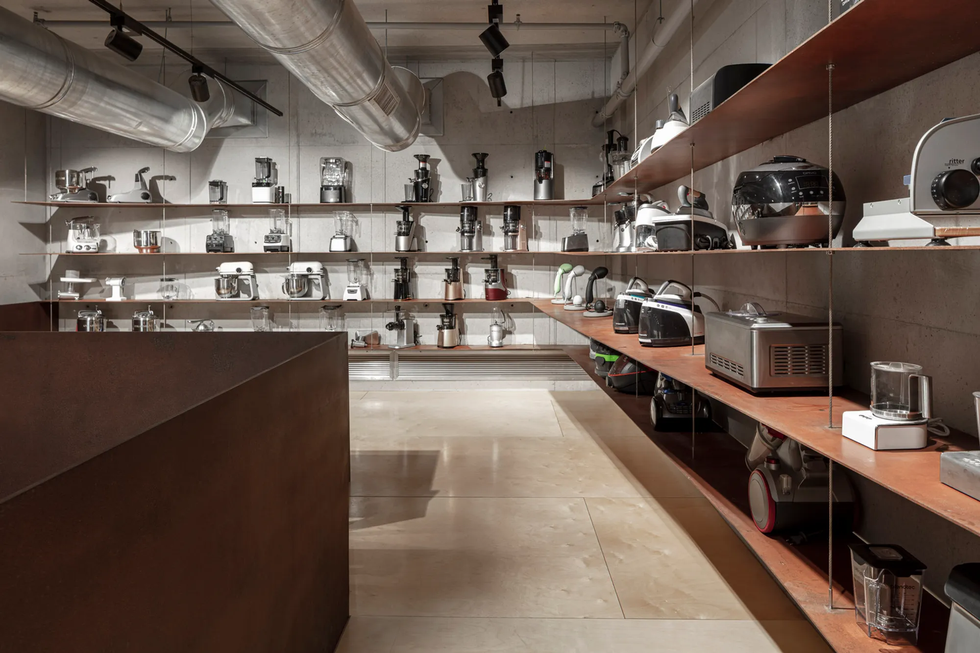 OIG Showroom & Demo Hall by Tal Goldsmith Fish Design Studio: A Minimalist Space for Culinary Innovation