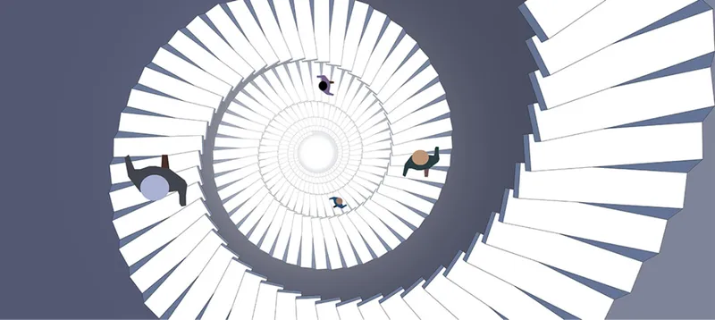 Overhead view of spiral staircase with radiating white steps and people on different levels