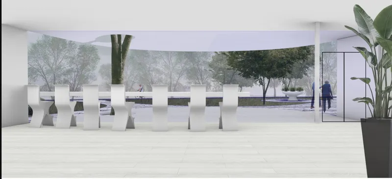 Interior view of the white sculptural seating elements beneath a continuous curved ceiling overlooking a winter landscape