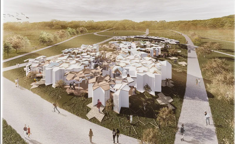 Elevated view of a circular cluster of white gable-roofed volumes surrounded by pathways and scattered trees