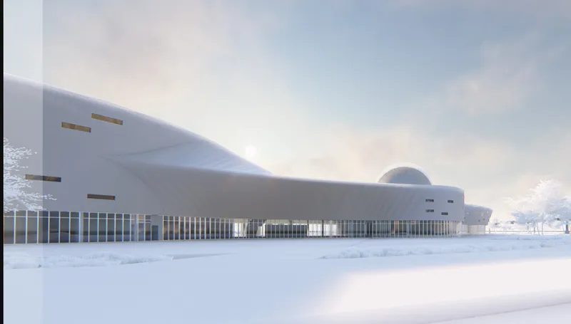 Long view of the undulating white roof and glazed base set in a snowy landscape at dusk
