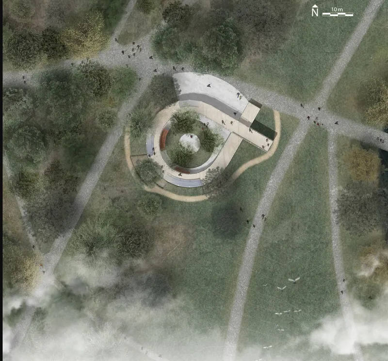 Aerial view of the circular building with central courtyard garden set within pathways and scattered vegetation