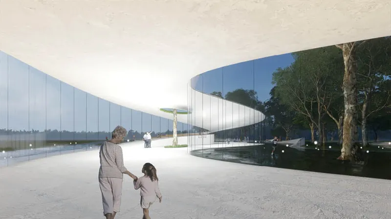 Curving reflective glass facade wrapping around a tree with visitors walking on white paving at twilight