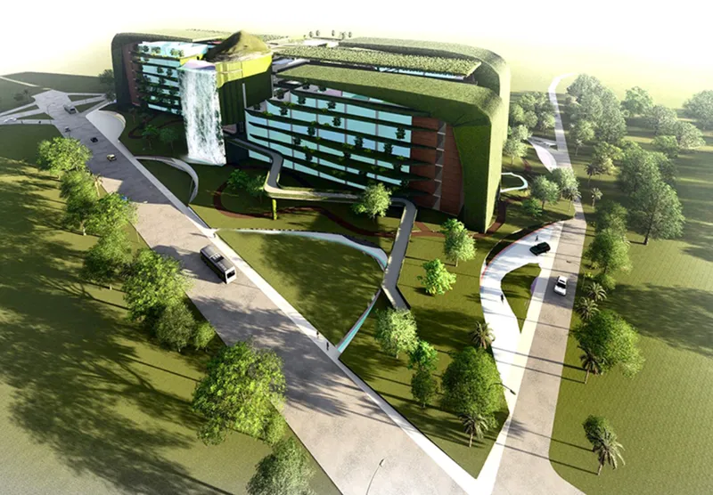 Aerial view of curved vehicular drive and pedestrian paths winding through landscaped grounds